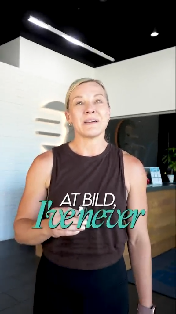 Fitness trainer sharing a testimonial at Bild fitness studio.